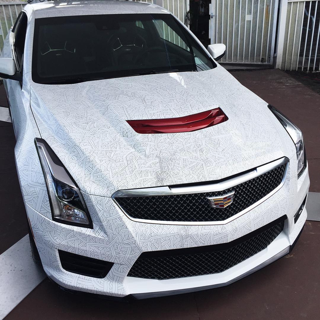 WHITE MATTE CADILLAC SEDAN