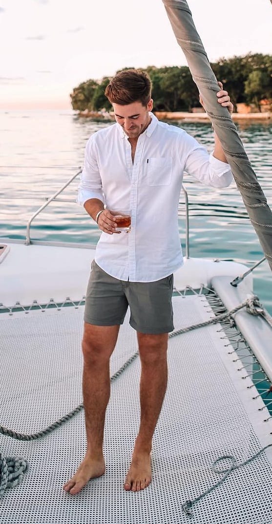 Grey shorts white shirt for yacht party Grey shorts white shirt for yacht party