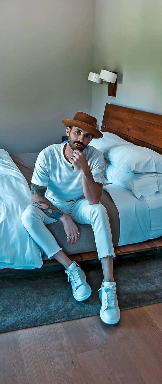 White stripped t-shirt white cropped trousers and hat
