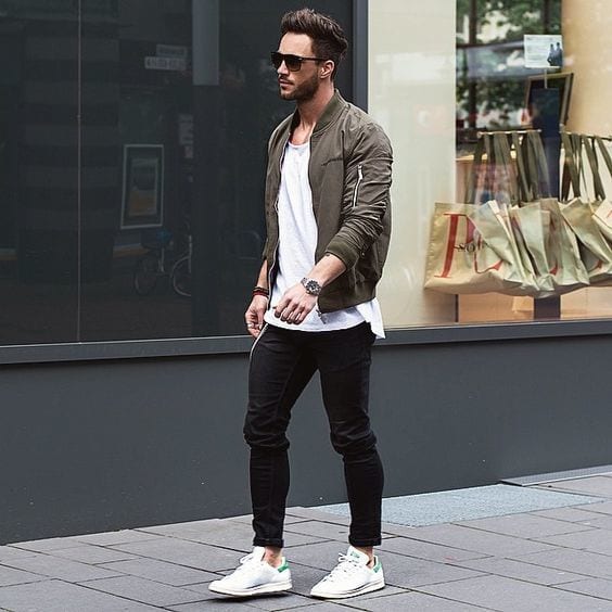 Olive-Bomber-jacket-styled-with-White-T-shirt-Black-Jeans-and-a-pair-of-White-Low-Top-Sneakers-1